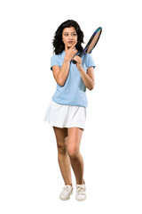 A full-length shot of a Young tennis player woman thinking an idea over isolated white background