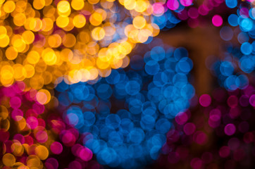Abstract colorful soft blurred bokeh on black background. Shining and blurred circles lights bokeh background. For used wallpaper texture and background.