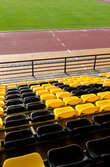 Fototapeta premium The sport seat grandstand in an empty stadium.