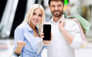 Spouses Showing Empty Mobile Phone Screen Standing In Mall, Mockup