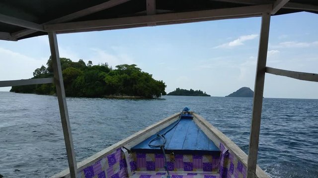 Outstanding island view from a boat on lake kivu, rwanda during Africa travel, at the background two islands