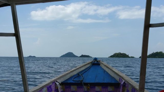 Outstanding island view from a boat on lake kivu, rwanda during Africa travel, at the background two islands