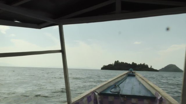 Sailing towards a island during a boat trip on lake Kivu in Africa Rwanda