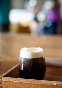 Glass of dark stout beer