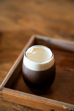 Glass of dark stout beer