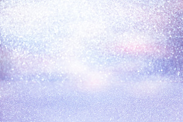 pastel purple glittering Christmas lights. Blurred abstract holiday background