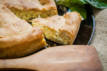 savory pie with cheese and eggs