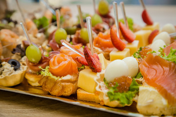 sandwiches and canapés with fish and meat