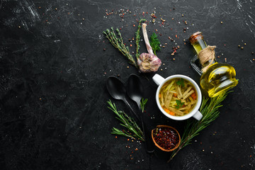 Chicken noodle soup. Dishes, food. Top view. Free space for your text.