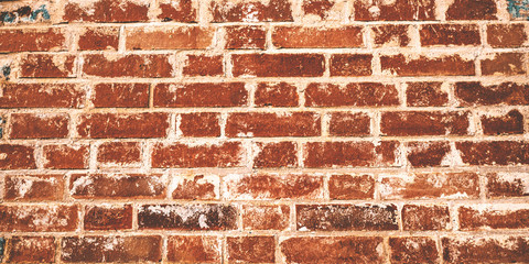 Brick wall pattern. Weathered stained old wall background.