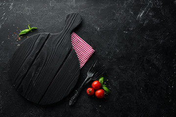 Black Stone Food Background. Cooking Ingredients. Top view. Free space for your text.