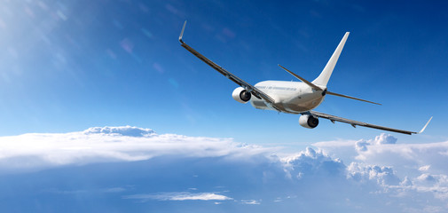 White airplane flying