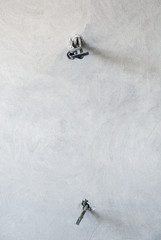 An unfinished electrical outlet with electrical wires