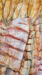 Background of dried and smoked fish at the fish market