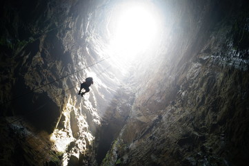 rappel in sink cave Golondrinas Mexico - obrazy, fototapety, plakaty