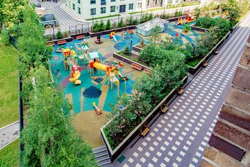 Modern playground in the courtyard of a residential building