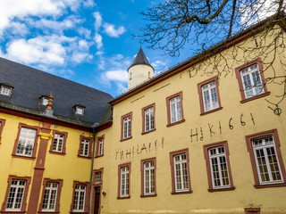 Fototapeta premium Steinfeld Abbey, former Premonstratensian monastery, now a Salvatorian convent in Steinfeld in Kall, North Rhine-Westphalia, Germany exterior partial view with anchor plates