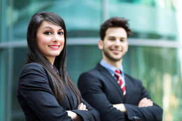 Business partners outdoor smiling confidently