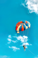 Parachuting above the clouds
