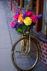 Fototapeta na wymiar Bike with Basket of Flowers