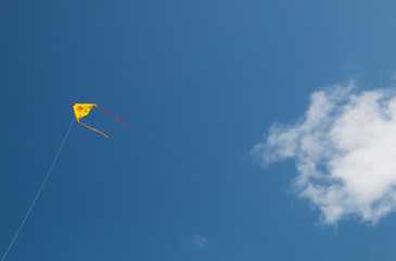 Colorful kite on a blue sky.