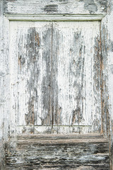 old white weathered wooden shutters
