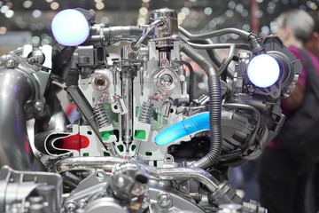 Cross section of motor with Injector at Autosalon Genf 2019 in Geneva, Switzerland