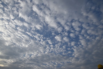 formation of cloud in the sky during the sunny day