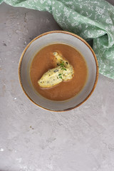 Porcini soup with pumpkin seed dumplings