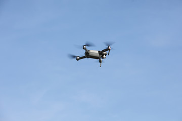 Drone flying overhead takes aerials professional photos