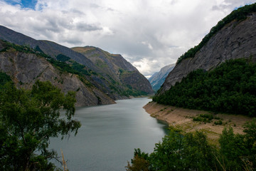 Obraz na płótnie Canvas Lac du Chambon is a reservoir on the Romanche river in Isère, Rhône-Alpes, France