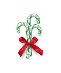 Three green striped candy canes with red bow isolated on white background. Vector Christmas and New Year design element.