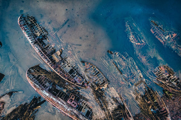 Cemetery of old ships in Teriberka Murmansk Russia, dramatic photo. Aerial top view
