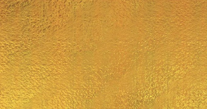 Golden foil background. Gold texture 3D rendering loop 4k