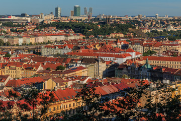 Panoramic view over the rooftops and historic buildings of the Prague Mala Strana district and the...
