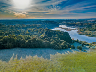 Obraz premium Landscape with frost shadows in the early autumn morning