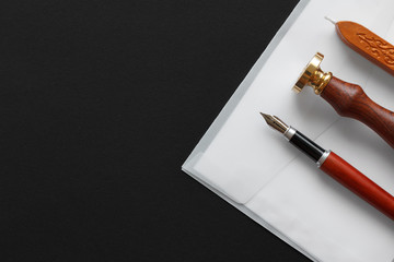 Notary public wax stamper. White envelope with brown wax seal, golden stamp. Responsive design...