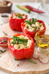 Tasty stuffed pepper on table