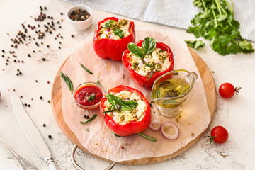 Tasty stuffed pepper on table