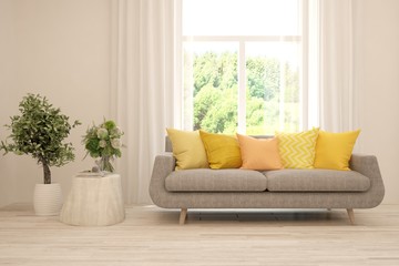 Stylish room in white color with colorful sofa and summer landscape in window. Scandinavian interior design. 3D illustration