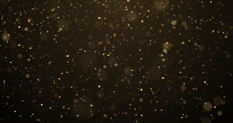 Golden glitter with bokeh light, gold particles splash on luxury black and gold background. Golden sparks splash, shimmer glow flow