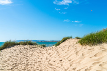 Camber Sands beach in East Sussex, in the village of Camber, UK. The 3 miles stretch is the only sand dune beach in East Sussex.