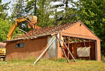 Excavator roof framework house demo