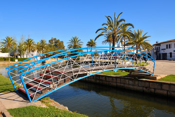 Footbridge over a canal in the city of Alcudia on Mallorca, Spain