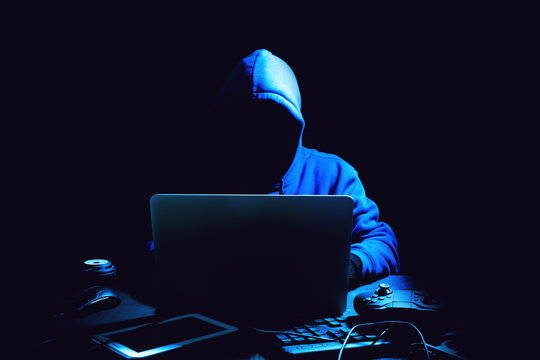 hacker man terrorist with virus computer attack to server network system online in data internet security hacking ai concept