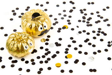 Funny pumpkins with googly eyes over the white background. Funny party invitation; halloween celebration concept