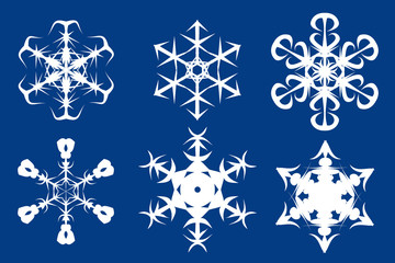 set of snowflakes on dark blue background