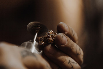 Jeweler working at workshop