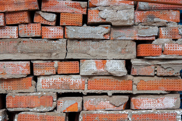 Red brickwork background. Material for the construction of buildings and structures.