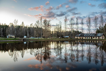 Ligatne village and the lake in foreground. Ligatne, Latvia. (high ISO image)